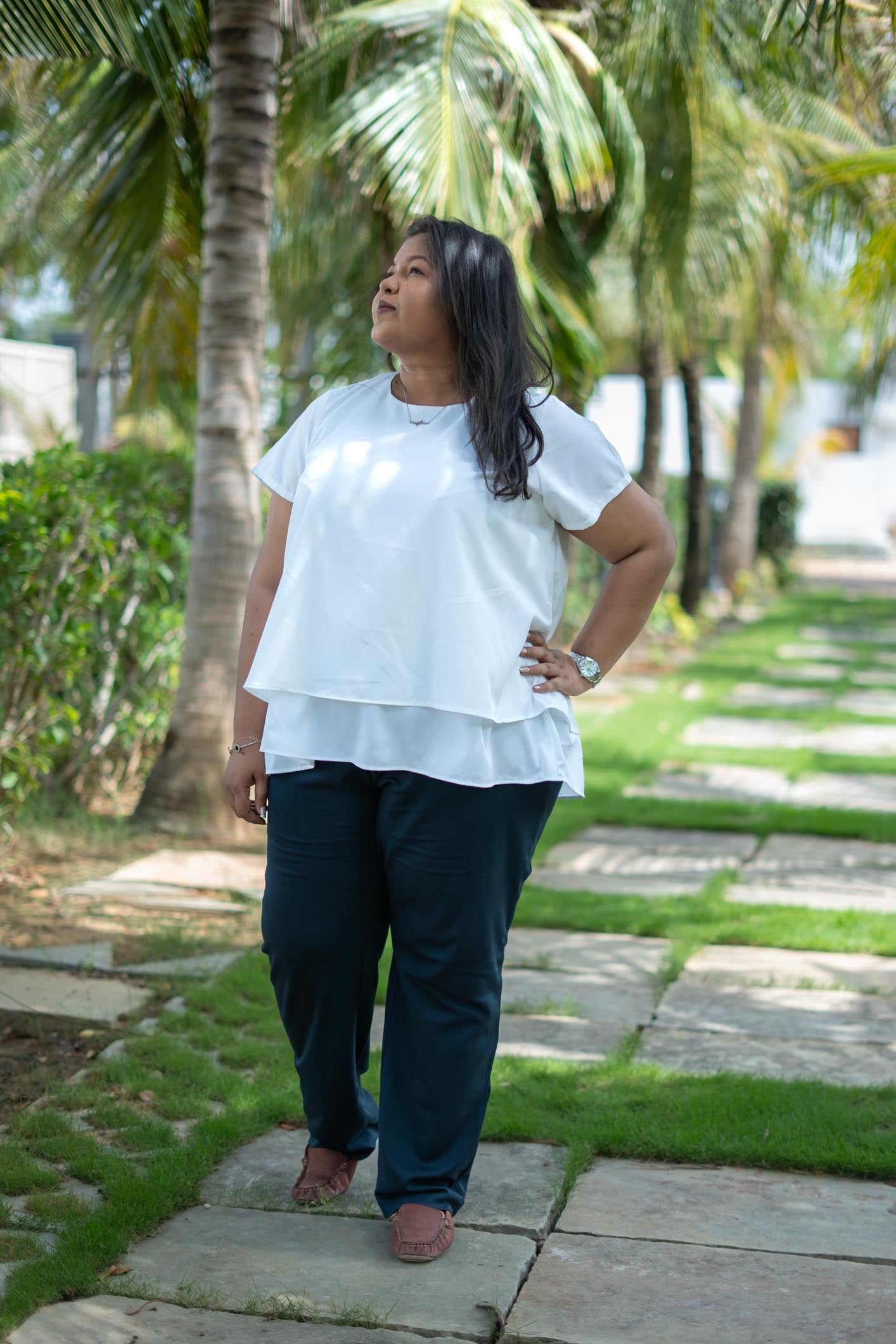 Woman in a white tiered top